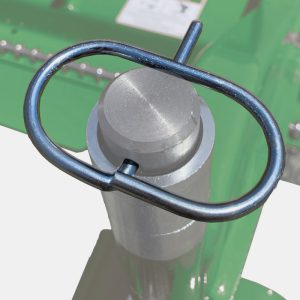 Wheel pins designed to stay in place even when mowing under bushes